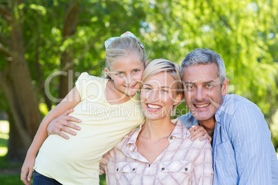Happy parents with their daughter