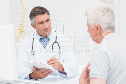 Senior patient sharing problems with doctor