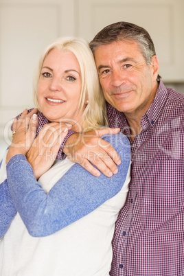 Happy mature couple smiling together