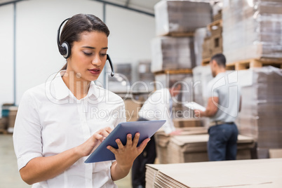 Female manager using digital tablet