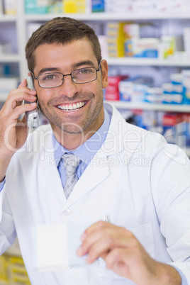 Happy pharmacist on the phone