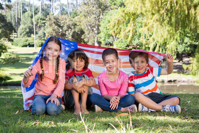 Happy little friends with american flag