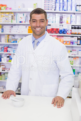 Smiling pharmacist looking at camera Smiling pharmacist looking at camera