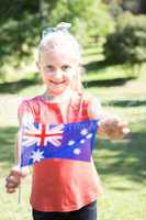 Little girl waving australian flag