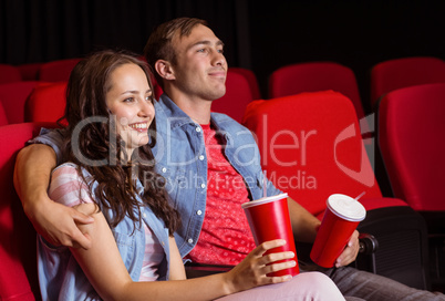 Young couple watching a film