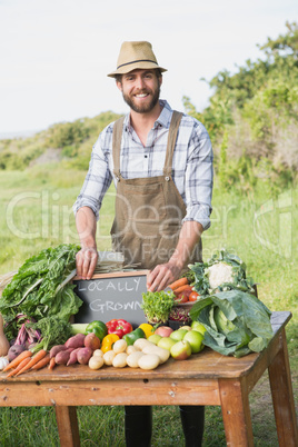 Farmer by his stall at the market