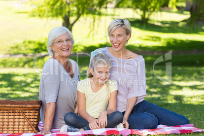 Happy blonde with her daughter and mother