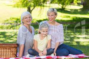 Happy blonde with her daughter and mother