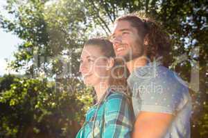 Cute couple smiling and hugging in the park