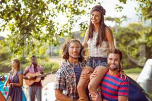 Pretty hipster on friends shoulders