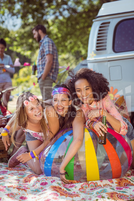 Happy hipsters having fun on campsite