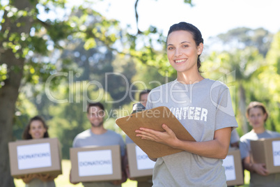 Happy volunteers in the park