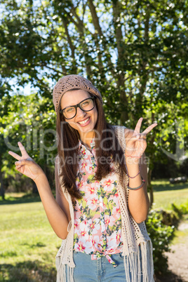 Pretty hipster smiling at camera