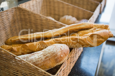 Basket with fresh breads and baguettes