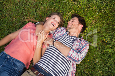 Cute couple relaxing in the park