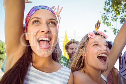 Excited young people singing along