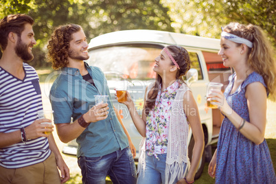 Hipster friends having a beer together