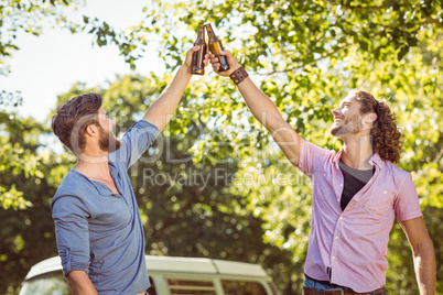 Hipster friends toasting with beers Hipster friends toasting with beers