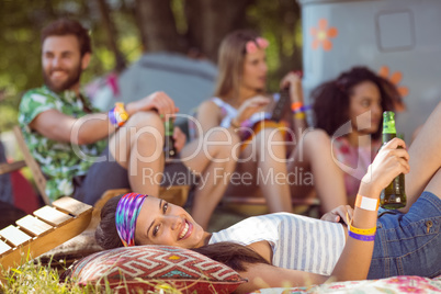 Happy hipsters relaxing on the campsite