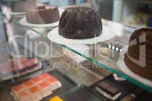 Display of fresh brownies and chocolate cakes