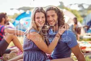 Hipster couple smiling at camera