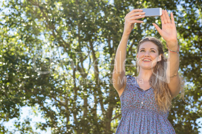 Pretty blonde taking a selfie