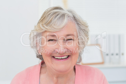 Happy female patient in clinic