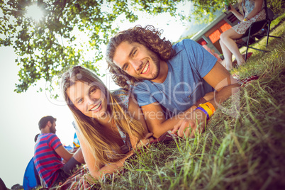 Hipster couple smiling at camera