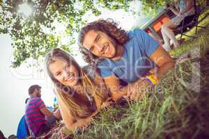 Hipster couple smiling at camera