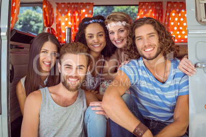 Hipster friends in a camper van Hipster friends in a camper van