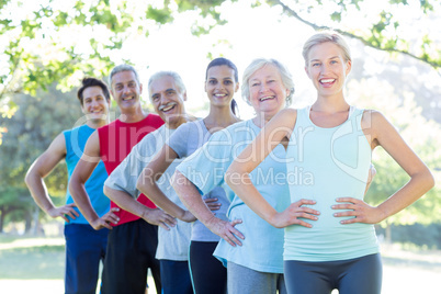 Happy athletic group smiling at camera