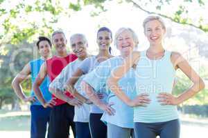 Happy athletic group smiling at camera