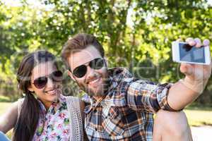 Young couple taking a selfie