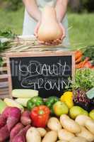 Woman selling organic vegetables