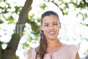 Happy young woman in the park