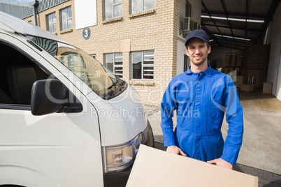 Delivery driver packing his van