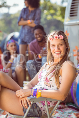 Carefree hipster having fun on campsite