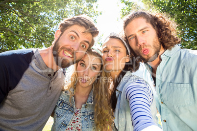 Happy friends taking a selfie