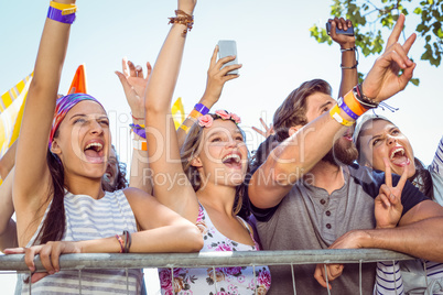 Excited music fans up the front