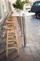 Bar stool and tables on the terrace