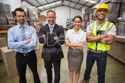 Warehouse team smiling at camera