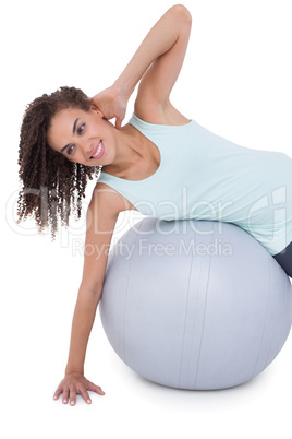 Fit woman wokring out on exercise ball