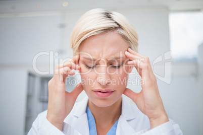 Doctor suffering from headache