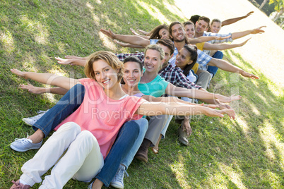 Happy friends in the park playing games