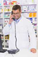 Happy pharmacist on the phone