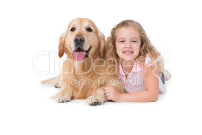 Little girl and dog lying on the floor