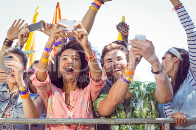 Excited music fans up the front