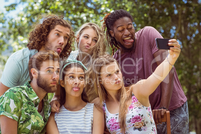 Happy friends taking a selfie