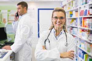 Pharmacist smiling with Pharmacist on the phone