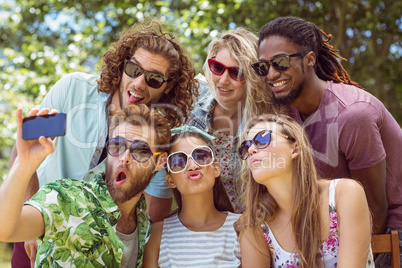 Happy friends taking a selfie